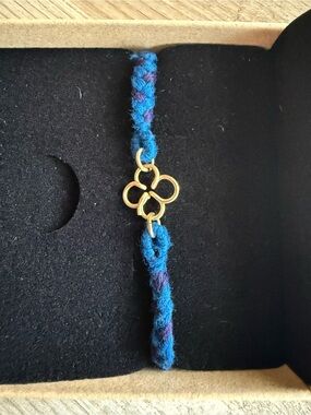 Gold Clover Charm Bracelet on Blue Woven Cord